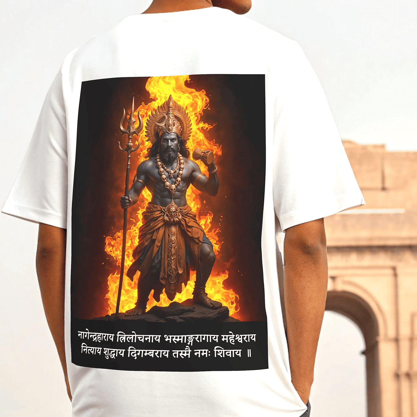 White t-shirt with a graphic of Shiva deity on fire and text, worn by a person by OFF THE RACK.