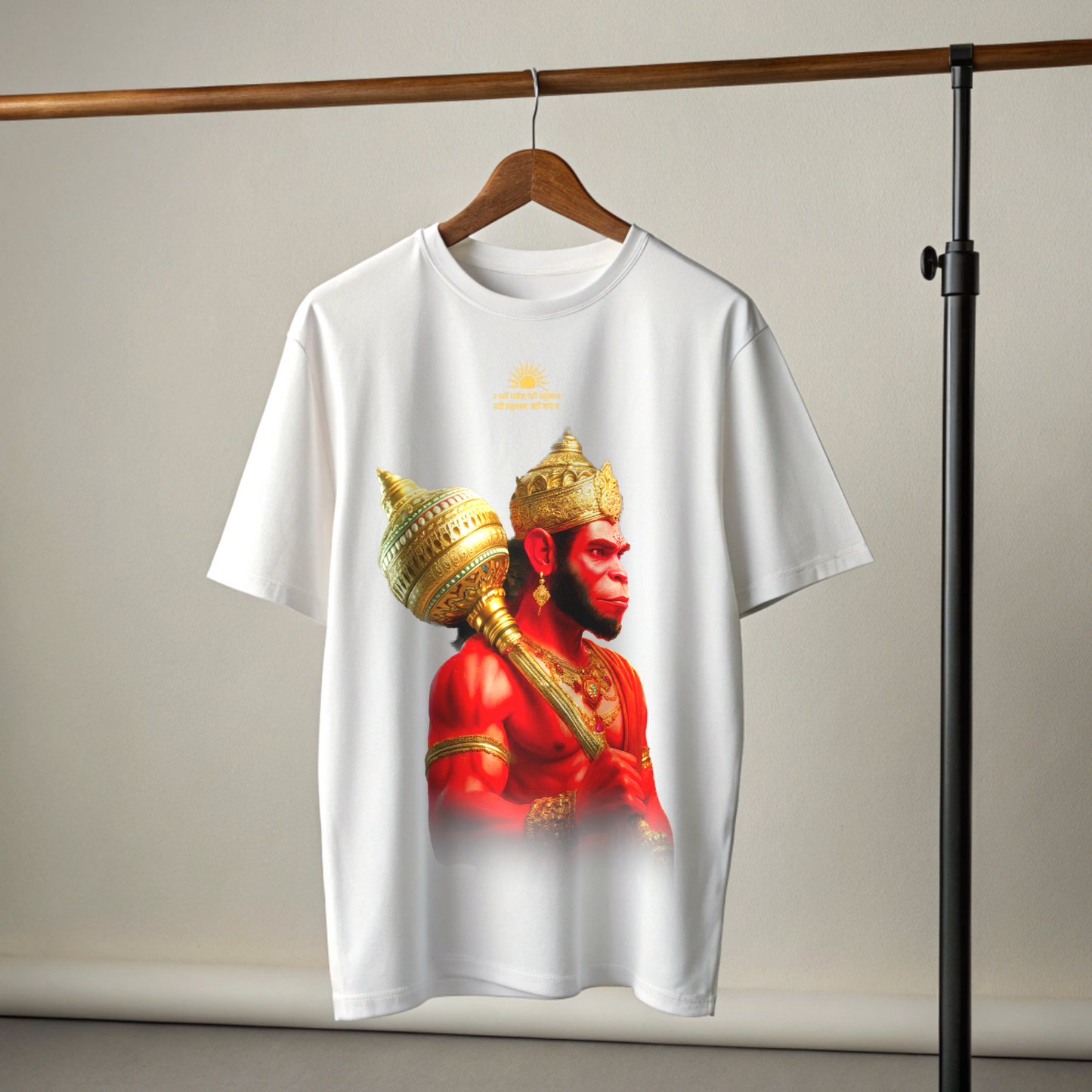 White t-shirt with a graphic of Lord Hanuman in red and gold on a hanger against a neutral background By OFF THE RACK