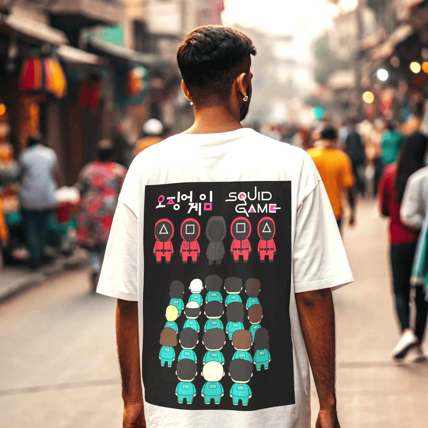 Person wearing a 'Squid Game' t-shirt with colorful characters on a busy street By OFF THE RACK