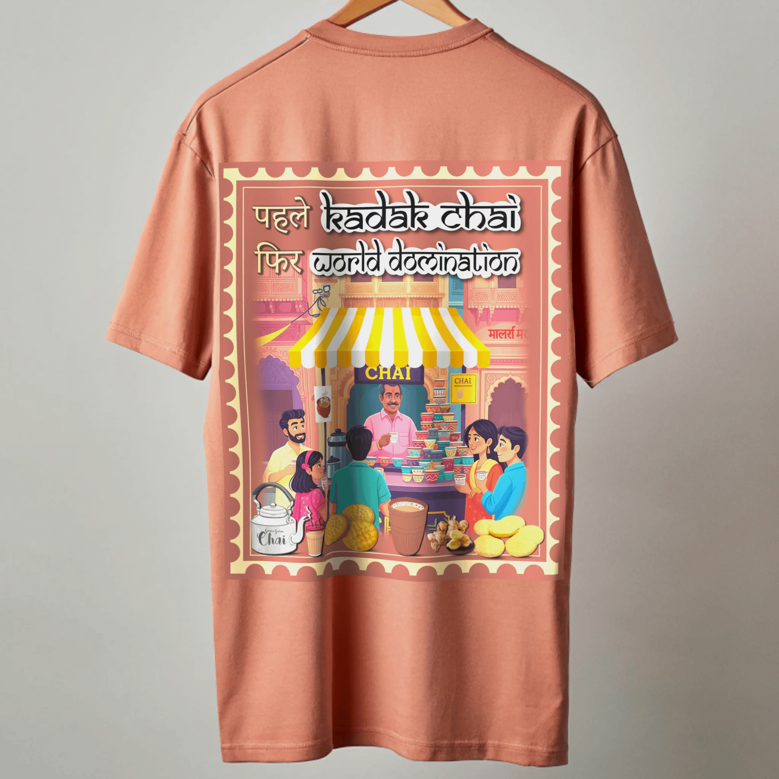 Coral t-shirt with a colorful tea stall graphic and KADAK CHAI WORLD DOMINATION text on a gray background by OFF THE RACK