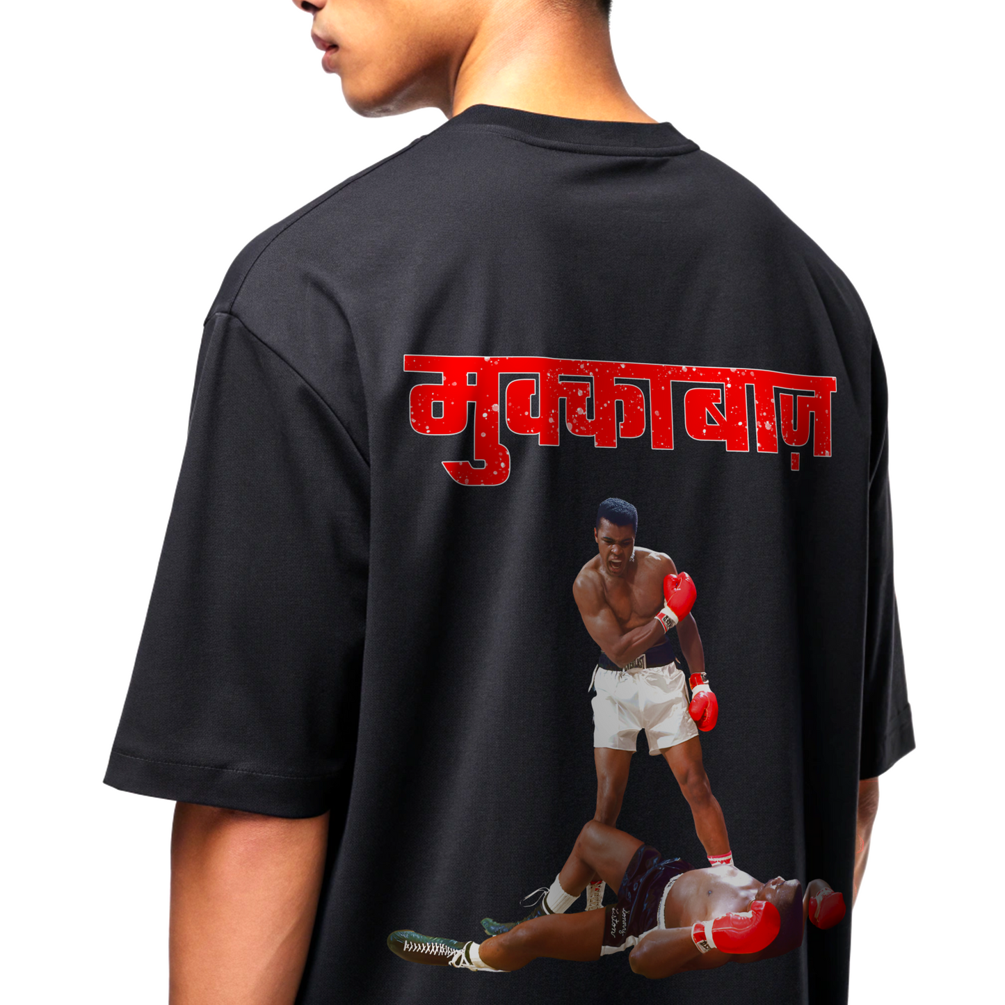 Black t-shirt with a graphic of two boxer and red MUKKEBAAZ text on the back, worn by a Model By OFF THE RACK